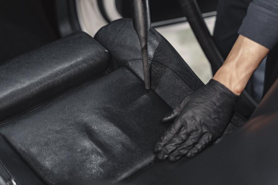 a man cleaning a car
