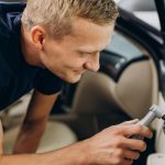a man during car detailing