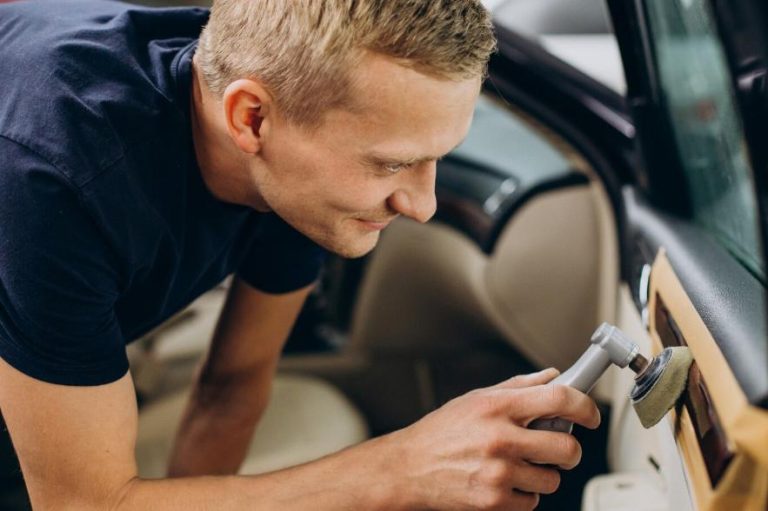 a man during car detailing